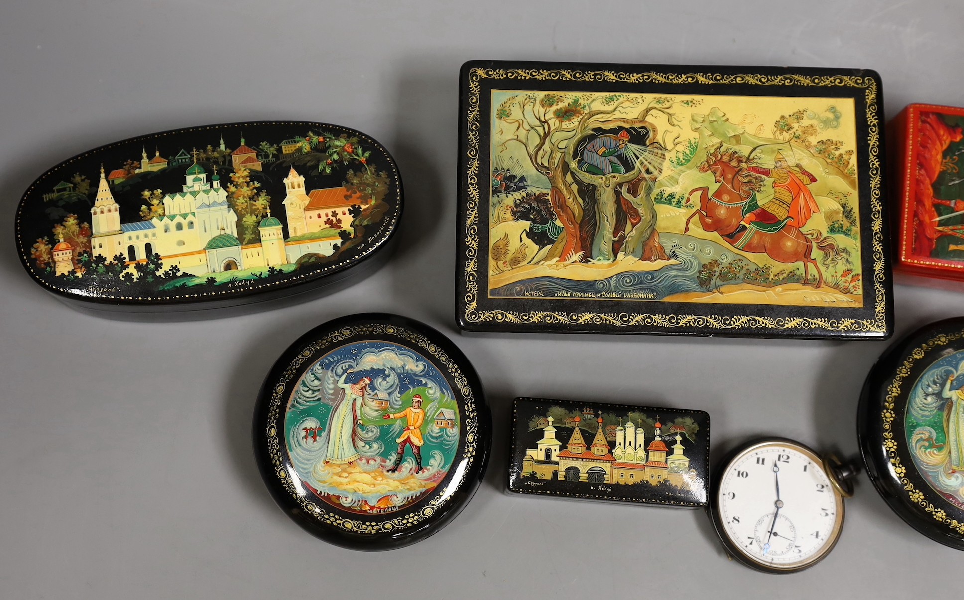A selection of six Russian papier mache boxes, largest 14.5cm long